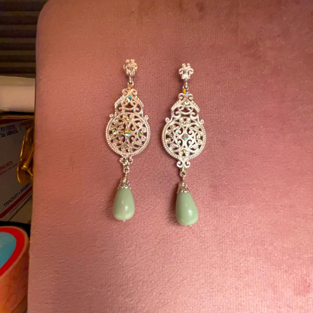 Silver earrings. May be plated in sterling silver. No 925 marking. NWOT